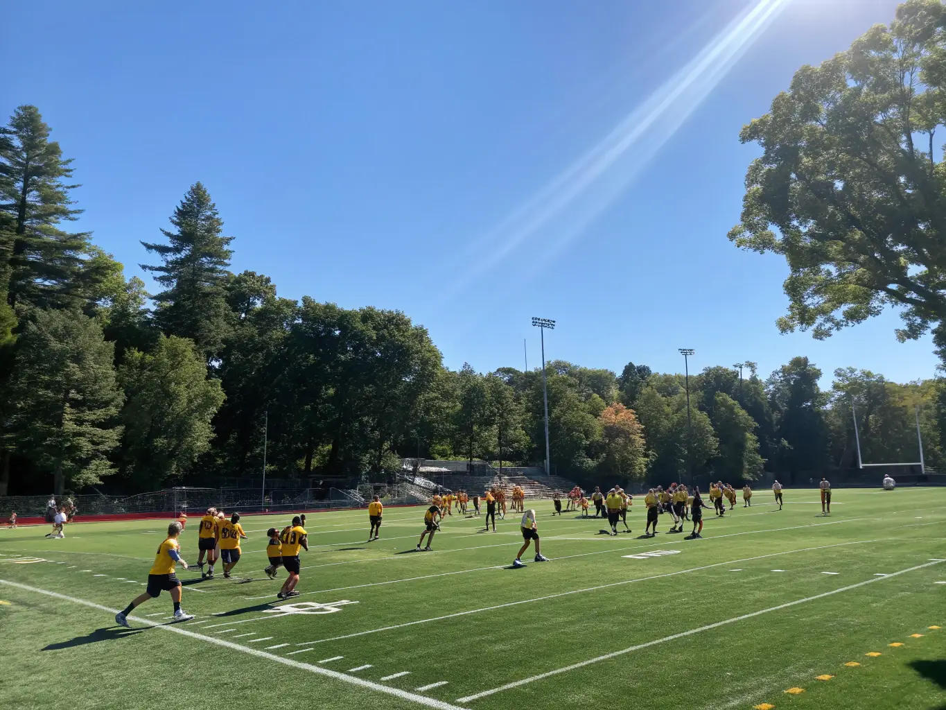 A dynamic image capturing students engaged in a football training session on the school field, showcasing teamwork and active participation.